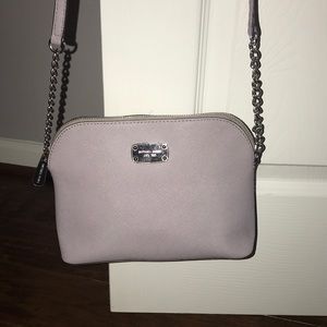 Michael Kors cross body purse. Barely used.